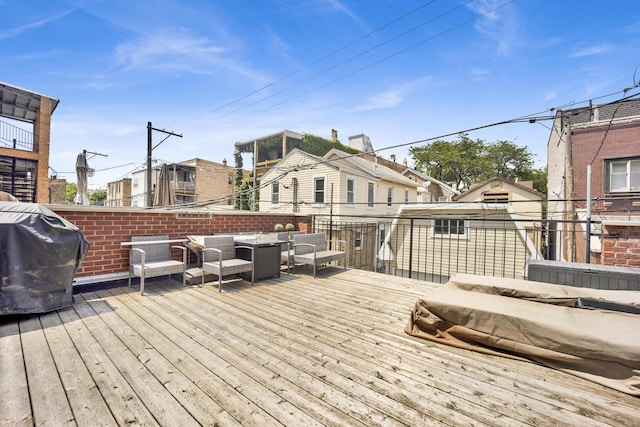 1428 W Lexington St Unit 1, Chicago, IL 60607 - deck featuring grilling area, outdoor lounge area, and a residential view