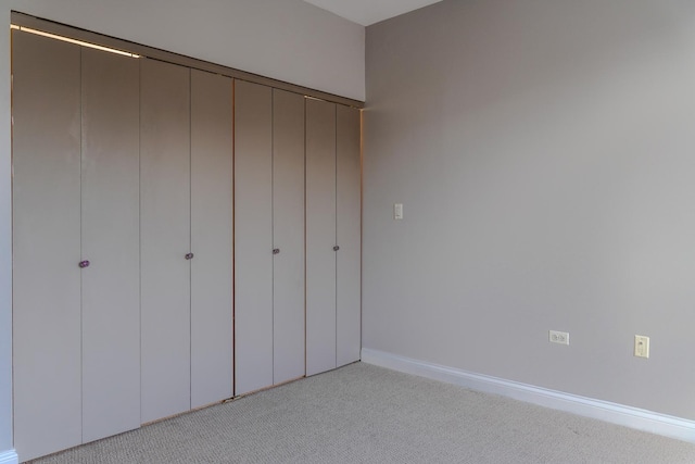 1444 N Orleans St Unit 6E, Chicago, IL 60610 - unfurnished bedroom with light colored carpet and baseboards