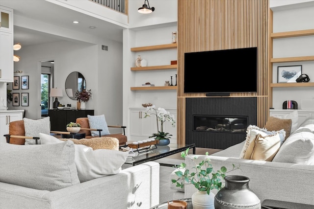 16226 Syd Creek Dr, Homer Glen, IL 60491 - living room with built in shelves and a glass covered fireplace