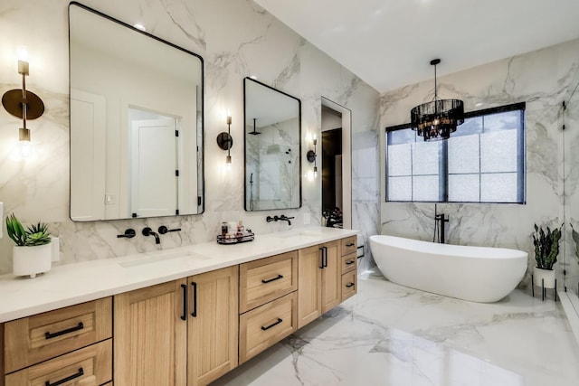 16226 Syd Creek Dr, Homer Glen, IL 60491 - bathroom with marble tiled flooring, a chandelier, double vanity, a freestanding bath, and tile walls