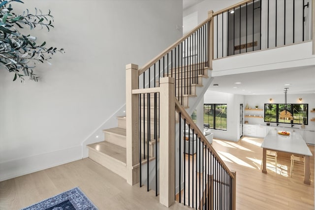16226 Syd Creek Dr, Homer Glen, IL 60491 - stairs featuring wood finished floors and a high ceiling