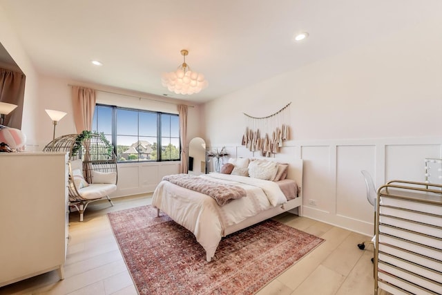 16226 Syd Creek Dr, Homer Glen, IL 60491 - bedroom with a wainscoted wall, a chandelier, light wood-type flooring, a decorative wall, and recessed lighting