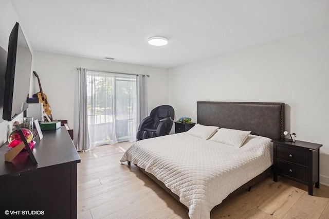 4050 Dundee Rd Unit 209, Northbrook, IL 60062 - bedroom featuring light wood finished floors and access to outside