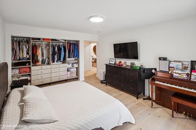 4050 Dundee Rd Unit 209, Northbrook, IL 60062 - bedroom with wood finished floors and a closet