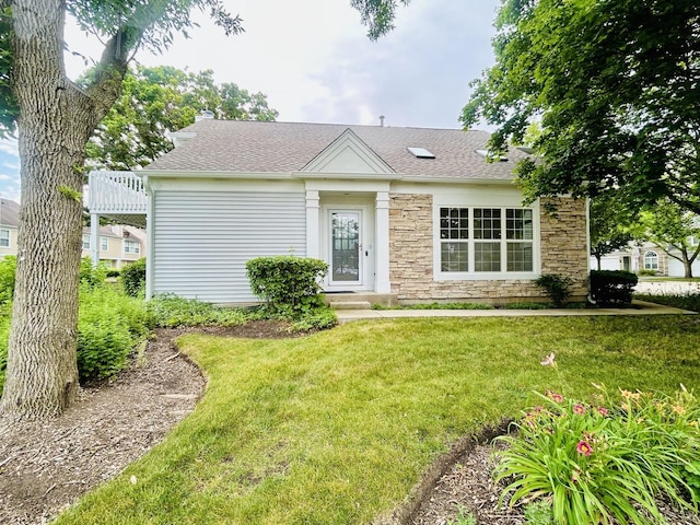 4797 Amber Cir, Hoffman Estates, IL 60192 - view of front of house featuring stone siding, a front lawn, and a shingled roof