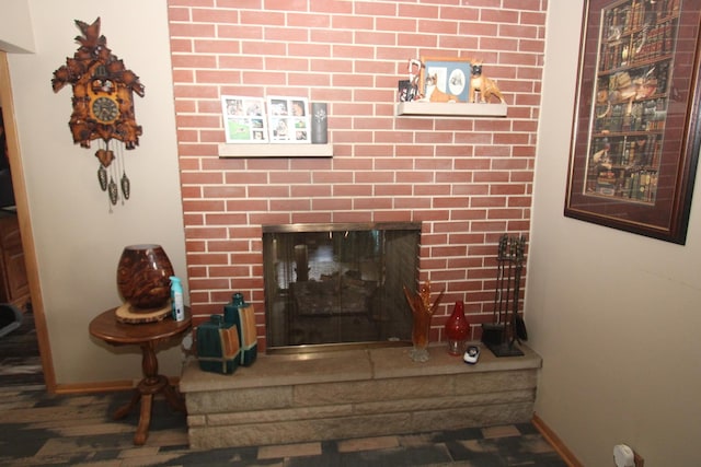 1005 Black Rd, Joliet, IL 60435 - detailed view of a fireplace with raised hearth and wood finished floors