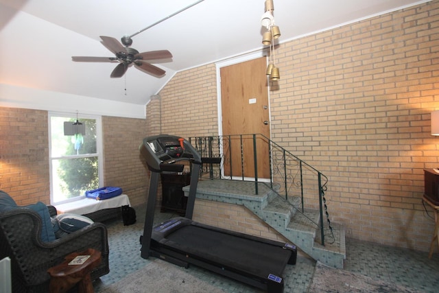 1005 Black Rd, Joliet, IL 60435 - exercise area featuring brick wall, vaulted ceiling, and a ceiling fan