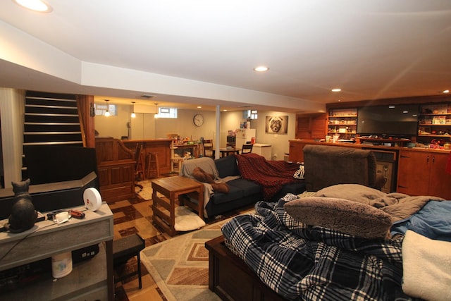 1005 Black Rd, Joliet, IL 60435 - living room featuring a bar, stairs, and recessed lighting