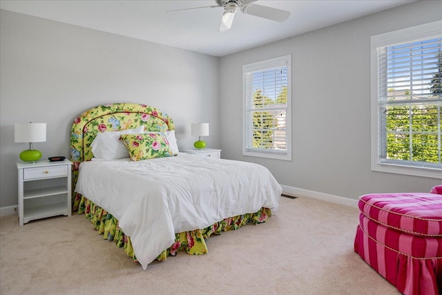 1781 Aberdeen Dr, Glenview, IL 60025 - bedroom featuring multiple windows, carpet, and a ceiling fan