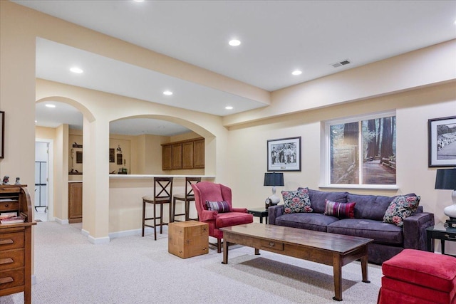 1781 Aberdeen Dr, Glenview, IL 60025 - living area featuring recessed lighting, light carpet, and arched walkways