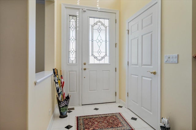 1781 Aberdeen Dr, Glenview, IL 60025 - foyer entrance with baseboards and light tile patterned floors