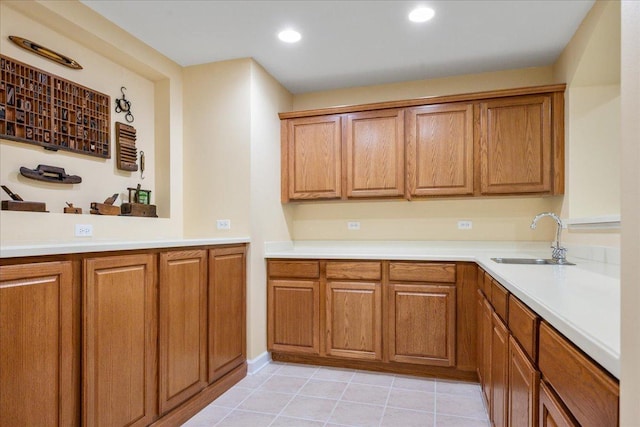 1781 Aberdeen Dr, Glenview, IL 60025 - kitchen with brown cabinetry, light countertops, light tile patterned flooring, and recessed lighting