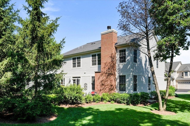 1781 Aberdeen Dr, Glenview, IL 60025 - back of property with a chimney and a yard