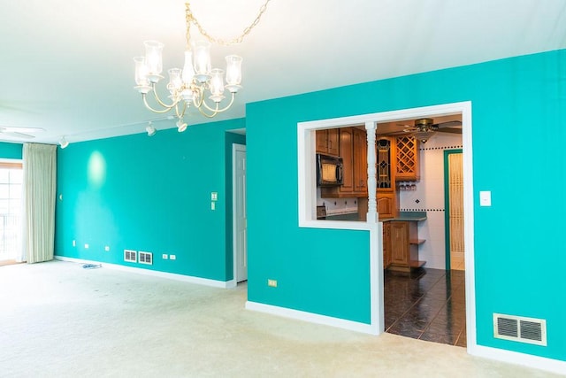 3427 Vollmer Rd Unit 209, Flossmoor, IL 60422 - carpeted spare room with a chandelier and baseboards