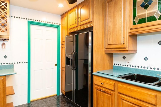 3427 Vollmer Rd Unit 209, Flossmoor, IL 60422 - kitchen featuring black refrigerator with ice dispenser, glass insert cabinets, decorative backsplash, and brown cabinetry