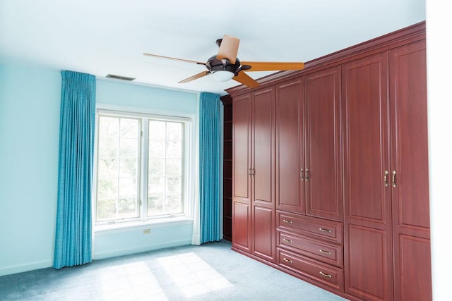 3427 Vollmer Rd Unit 209, Flossmoor, IL 60422 - unfurnished bedroom with light colored carpet, multiple windows, and a ceiling fan