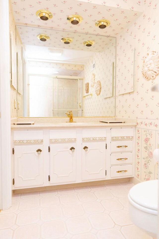 3427 Vollmer Rd Unit 209, Flossmoor, IL 60422 - bathroom with wallpapered walls, vanity, tile patterned floors, and a shower stall