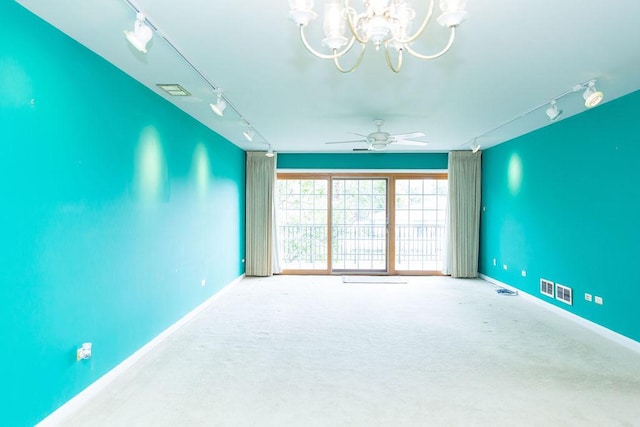 3427 Vollmer Rd Unit 209, Flossmoor, IL 60422 - carpeted empty room featuring track lighting, a chandelier, and a ceiling fan