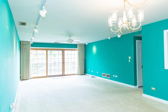 3427 Vollmer Rd Unit 209, Flossmoor, IL 60422 - unfurnished room with track lighting, carpet flooring, a chandelier, and a ceiling fan