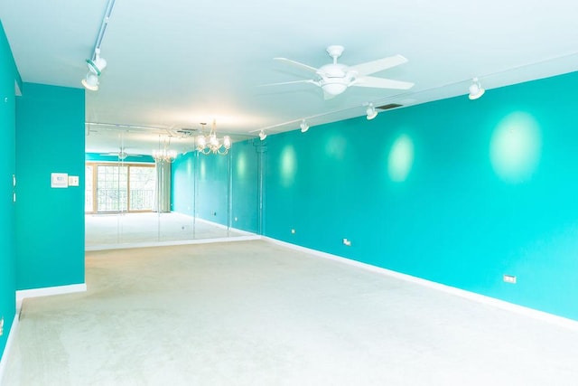 3427 Vollmer Rd Unit 209, Flossmoor, IL 60422 - carpeted spare room with rail lighting, a chandelier, and a ceiling fan