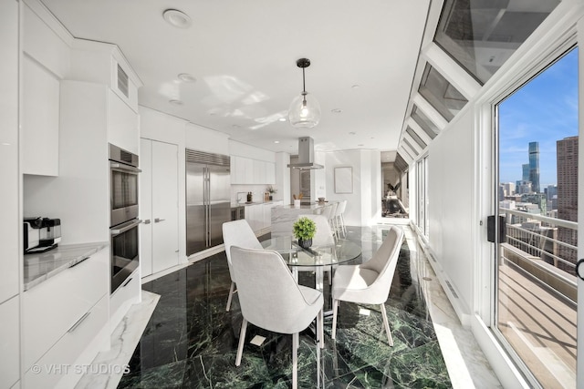 950 N Michigan Ave Unit 4904, Chicago, IL 60611 - dining room with marble tiled flooring and a skyline view
