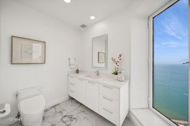 950 N Michigan Ave Unit 4904, Chicago, IL 60611 - bathroom with marble finish flooring, vanity, a water view, and recessed lighting