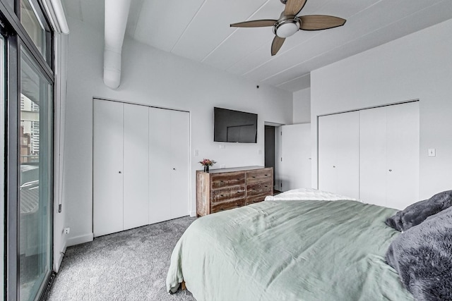 920 W Madison St Unit F8, Chicago, IL 60607 - bedroom featuring carpet, two closets, and a ceiling fan