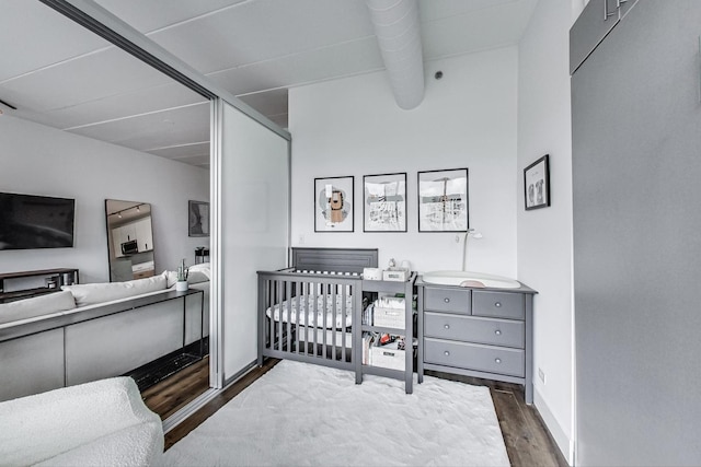 920 W Madison St Unit F8, Chicago, IL 60607 - bedroom with wood finished floors and a crib