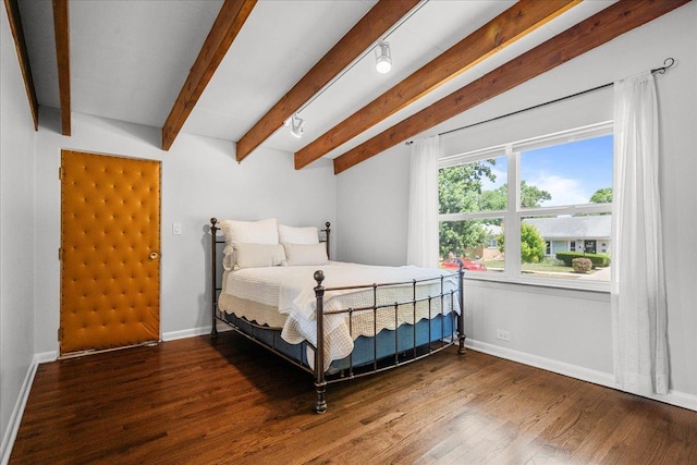 8844 Laramie Ave, Skokie, IL 60077 - bedroom with beamed ceiling and wood finished floors