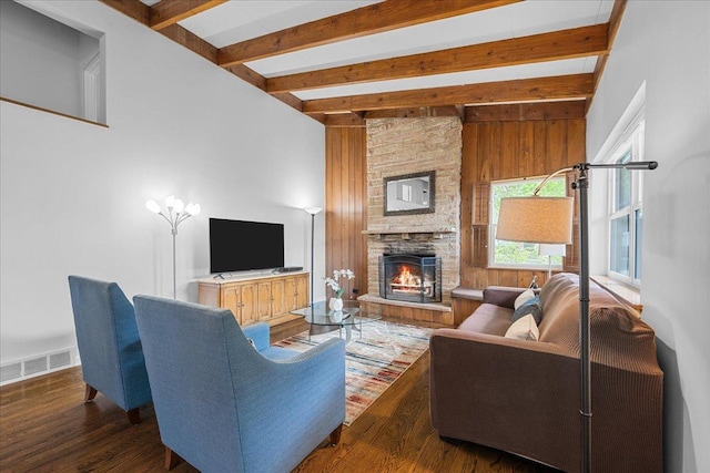 8844 Laramie Ave, Skokie, IL 60077 - living area with beam ceiling, wood finished floors, and a fireplace