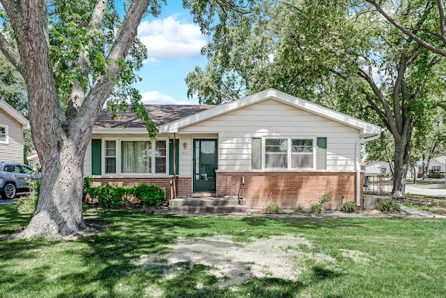 521 Michael Ave, Crete, IL 60417 - view of front of property with brick siding and a front yard