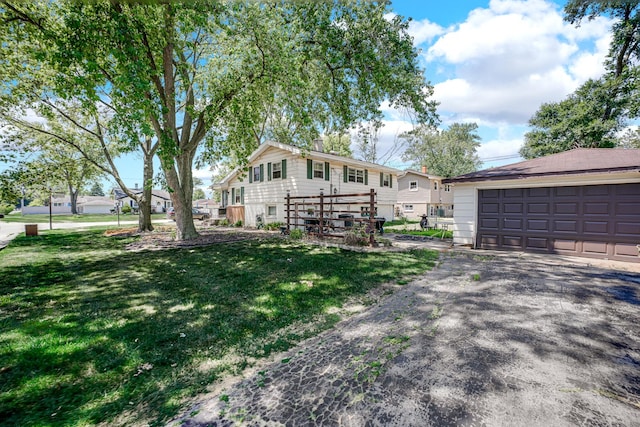 521 Michael Ave, Crete, IL 60417 - view of front of home with a front lawn and a detached garage