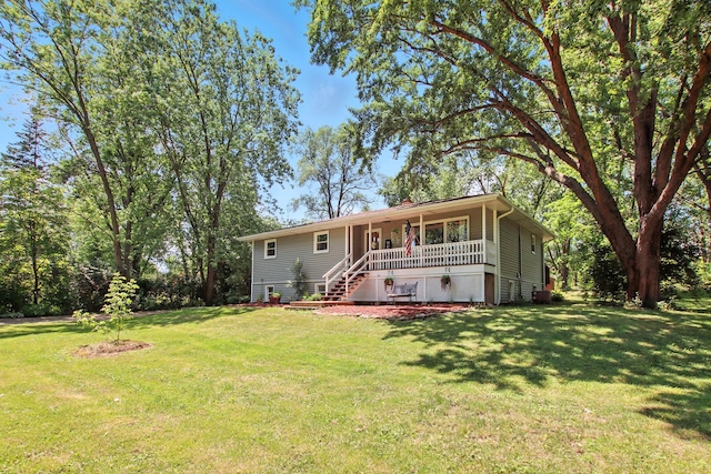 40474 N Glendale Ave, Beach Park, IL 60099 - rear view of property featuring a yard, stairway, and a porch