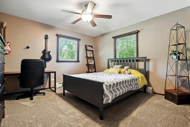 40474 N Glendale Ave, Beach Park, IL 60099 - carpeted bedroom featuring multiple windows, a baseboard heating unit, an office area, and ceiling fan