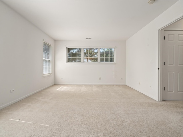 775 N Regis Ct, Palatine, IL 60067 - empty room with light colored carpet and a smoke detector