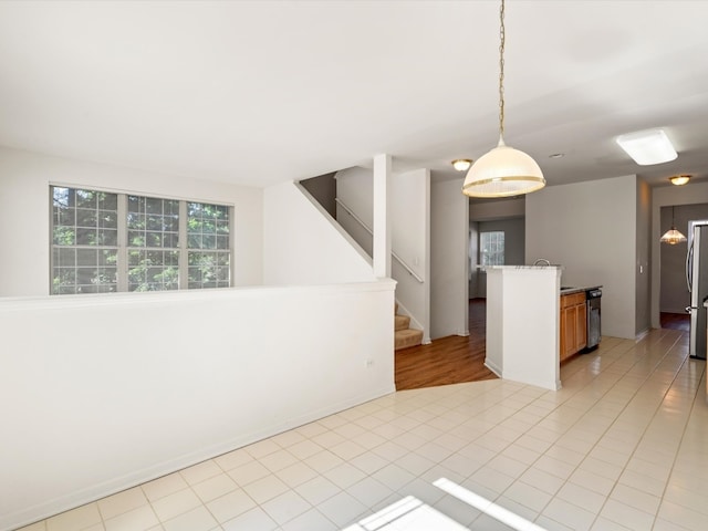 775 N Regis Ct, Palatine, IL 60067 - kitchen with pendant lighting and light tile patterned floors