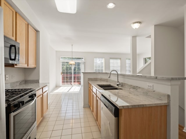775 N Regis Ct, Palatine, IL 60067 - kitchen with stainless steel appliances, light tile patterned floors, light stone counters, decorative light fixtures, and recessed lighting