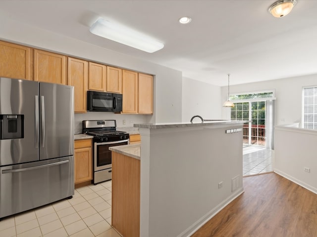 775 N Regis Ct, Palatine, IL 60067 - kitchen featuring appliances with stainless steel finishes, light brown cabinetry, decorative light fixtures, an island with sink, and recessed lighting