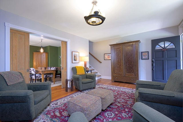 314 Elk St, Galena, IL 61036 - living area featuring wood finished floors and stairway