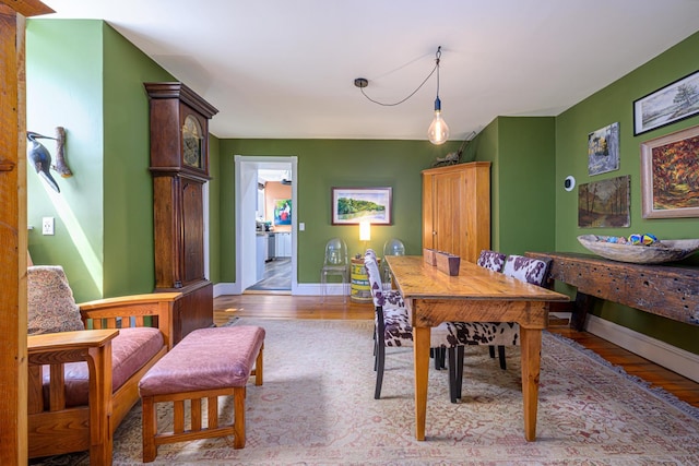 314 Elk St, Galena, IL 61036 - dining area featuring baseboards and light wood finished floors