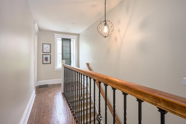 314 Elk St, Galena, IL 61036 - hall featuring an upstairs landing and dark wood-style floors