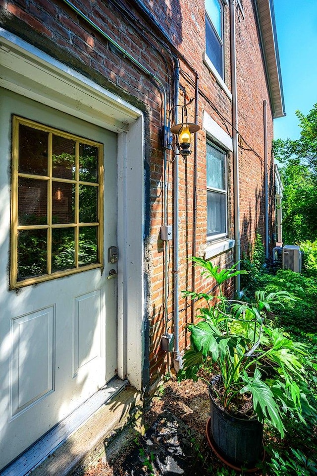 314 Elk St, Galena, IL 61036 - view of exterior entry featuring brick siding