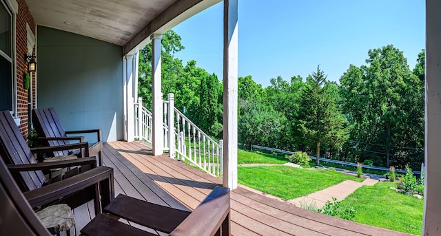 314 Elk St, Galena, IL 61036 - wooden deck with a lawn and view of scattered trees
