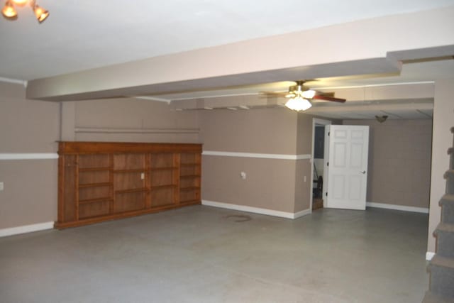 707 Omaha Ave, Lincoln, IL 62656 - unfurnished living room with concrete floors and ceiling fan