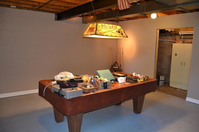 707 Omaha Ave, Lincoln, IL 62656 - rec room with finished concrete floors, concrete block wall, and pool table