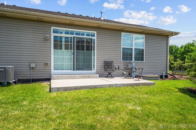 1126 Mandalay Ln Unit 1126, Bolingbrook, IL 60490 - rear view of property with a patio area and a yard