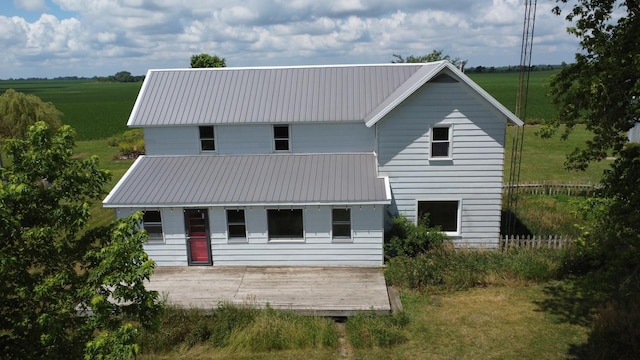 2371 N 3100 E Rd, Donovan, IL 60931 - view of front of property with a metal roof, a wooden deck, and a front lawn