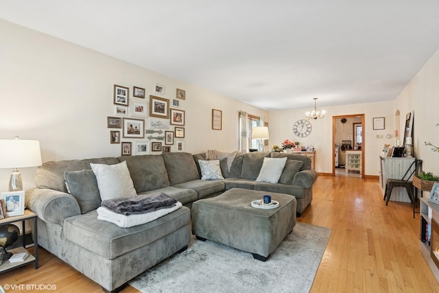 10536 S Artesian Ave, Chicago, IL 60655 - living area with a chandelier and light wood-style floors