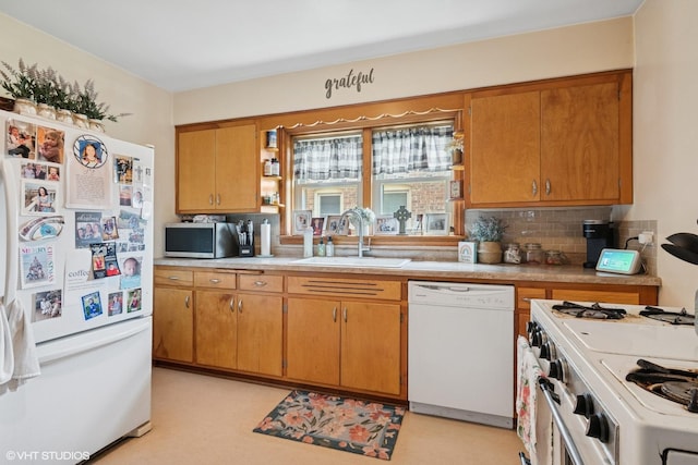 10536 S Artesian Ave, Chicago, IL 60655 - kitchen with white appliances, open shelves, light countertops, backsplash, and brown cabinets