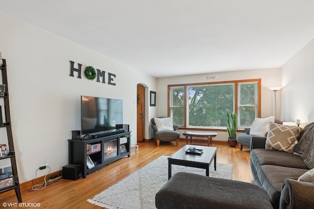 10536 S Artesian Ave, Chicago, IL 60655 - living room with arched walkways and light wood-style floors